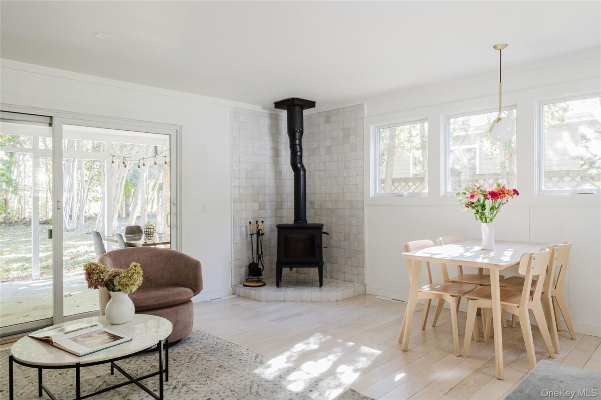 Dining room, Fireplace, Interior, Pendant Lights, Stone Walls, Wood Texture Flooring