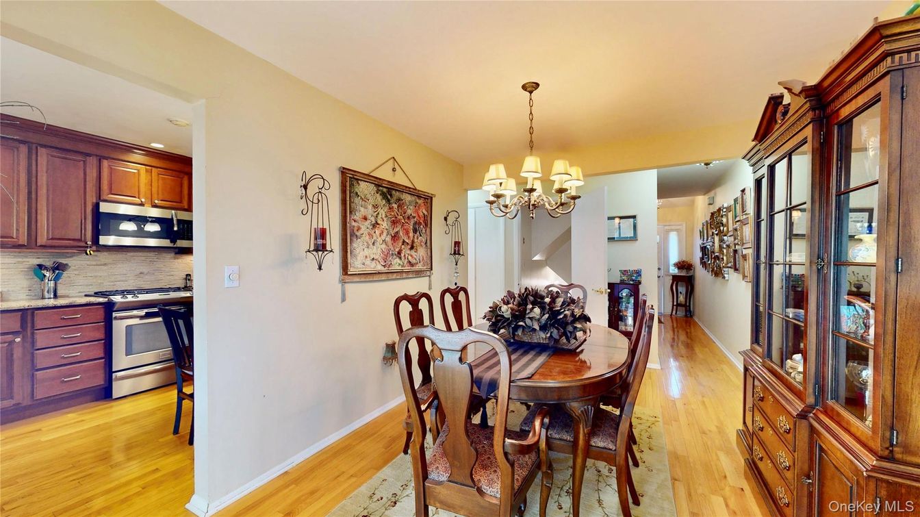 Chandelier, Dining room, Interior, Kitchen, Recessed Lighting, Stainless Steel Appliances, Wood Texture Flooring