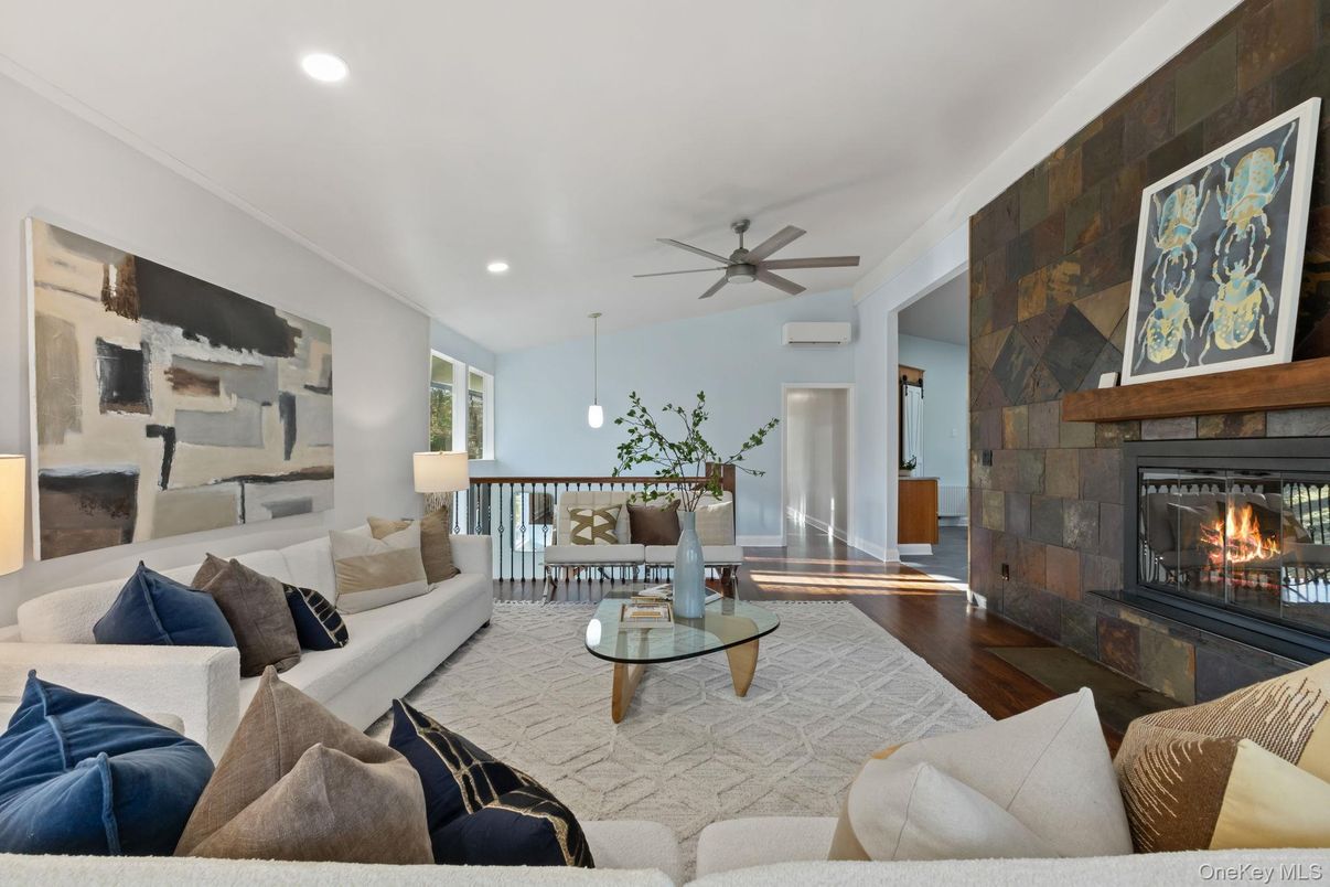 Dining room, Fireplace, Interior, Living room, Pendant Lights, Recessed Lighting, Stone Walls, Wood Texture Flooring