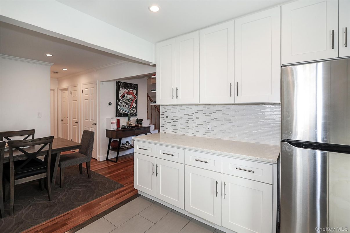 Dining room, Interior, Kitchen, Recessed Lighting, Stainless Steel Appliances, Wood Texture Flooring