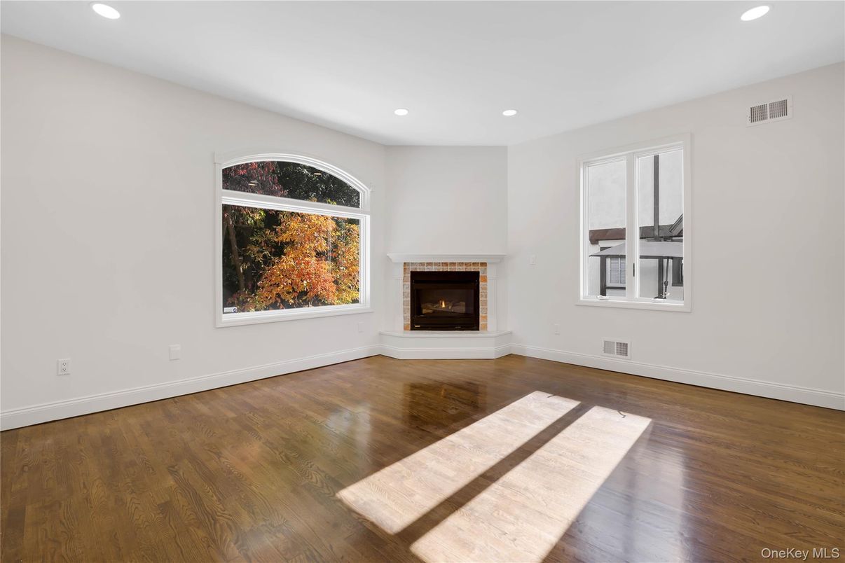 Empty room, Fireplace, Interior, Recessed Lighting, Wood Texture Flooring