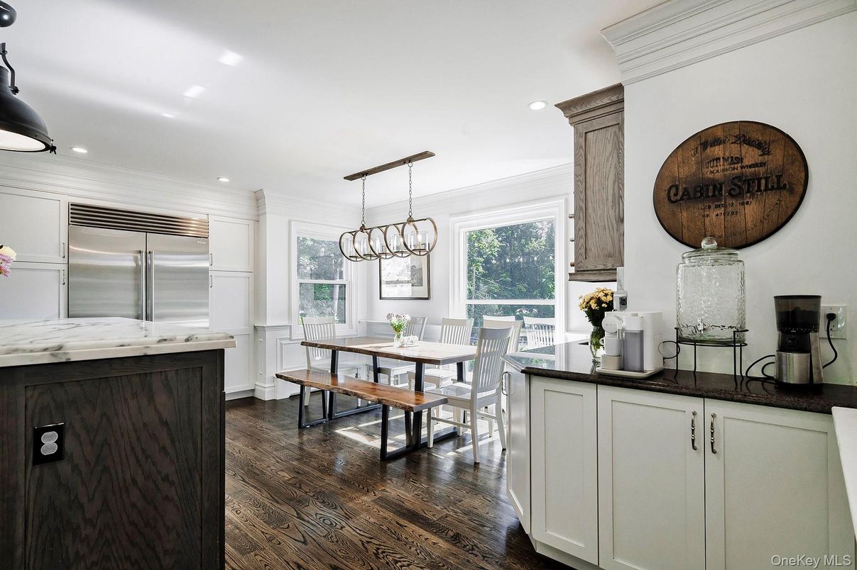 Chandelier, Dining room, Interior, Kitchen, Pendant Lights, Recessed Lighting, Stainless Steel Appliances, Wood Texture Flooring