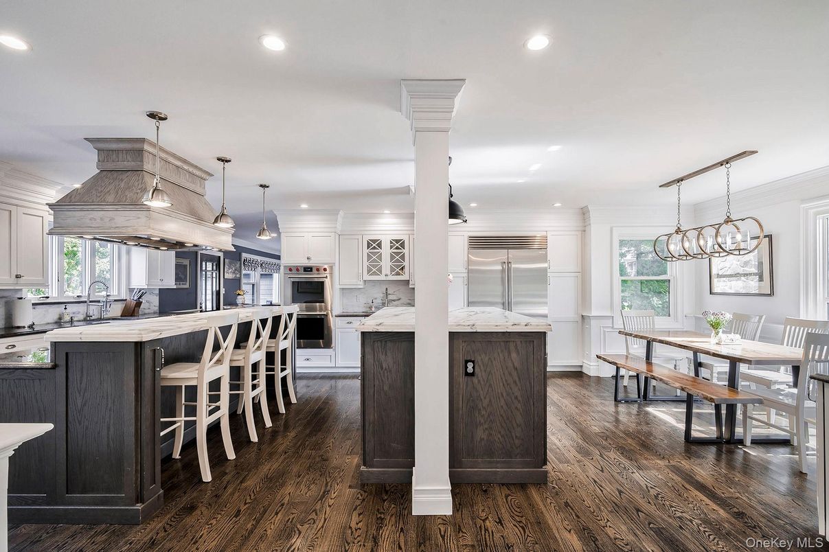 Chandelier, Dining room, Interior, Kitchen, Pendant Lights, Recessed Lighting, Stainless Steel Appliances, Wood Texture Flooring