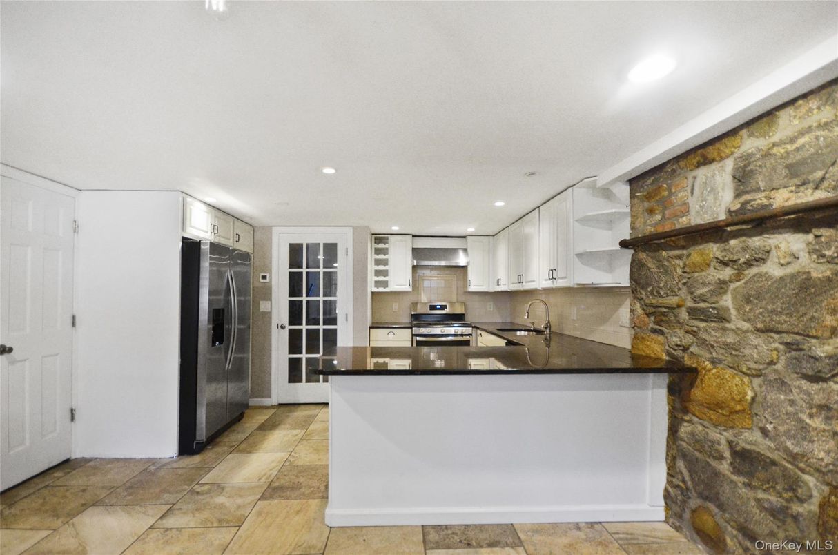Interior, Kitchen, Recessed Lighting, Stainless Steel Appliances, Stone Walls