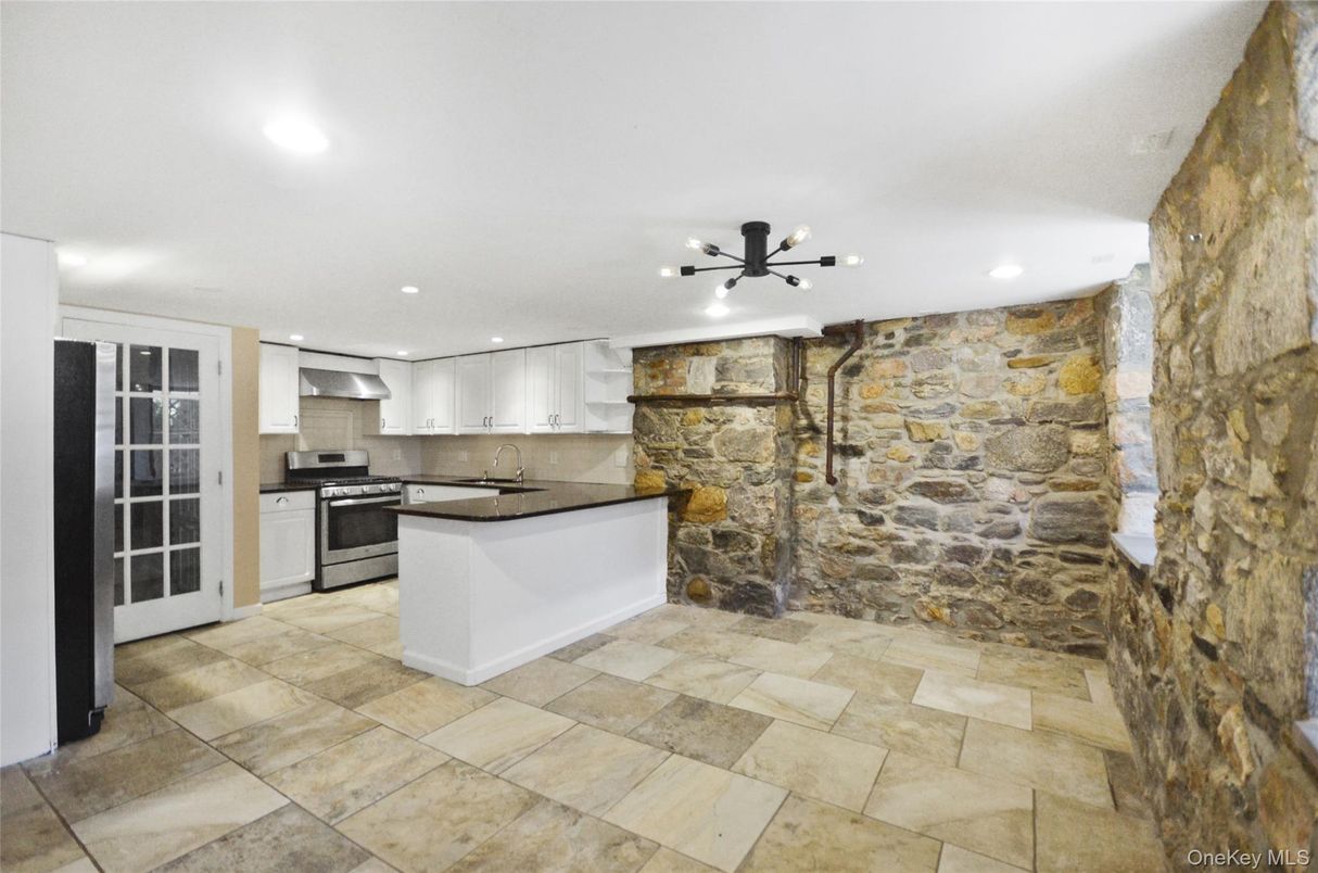 Interior, Kitchen, Pendant Lights, Recessed Lighting, Stainless Steel Appliances, Stone Walls