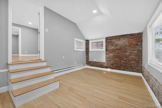 Empty room, Interior, Recessed Lighting, Stone Walls, Wood Texture Flooring