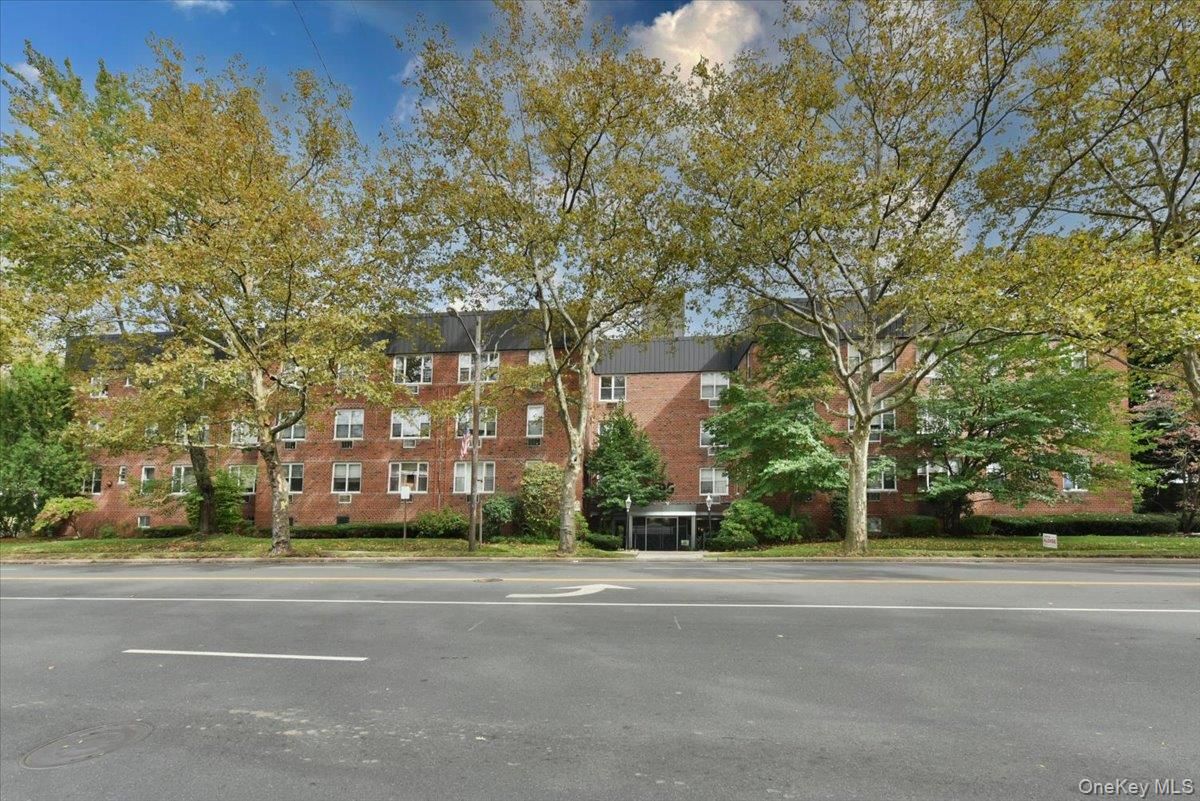 Exterior, Facade, Brick Facade, Condo Building