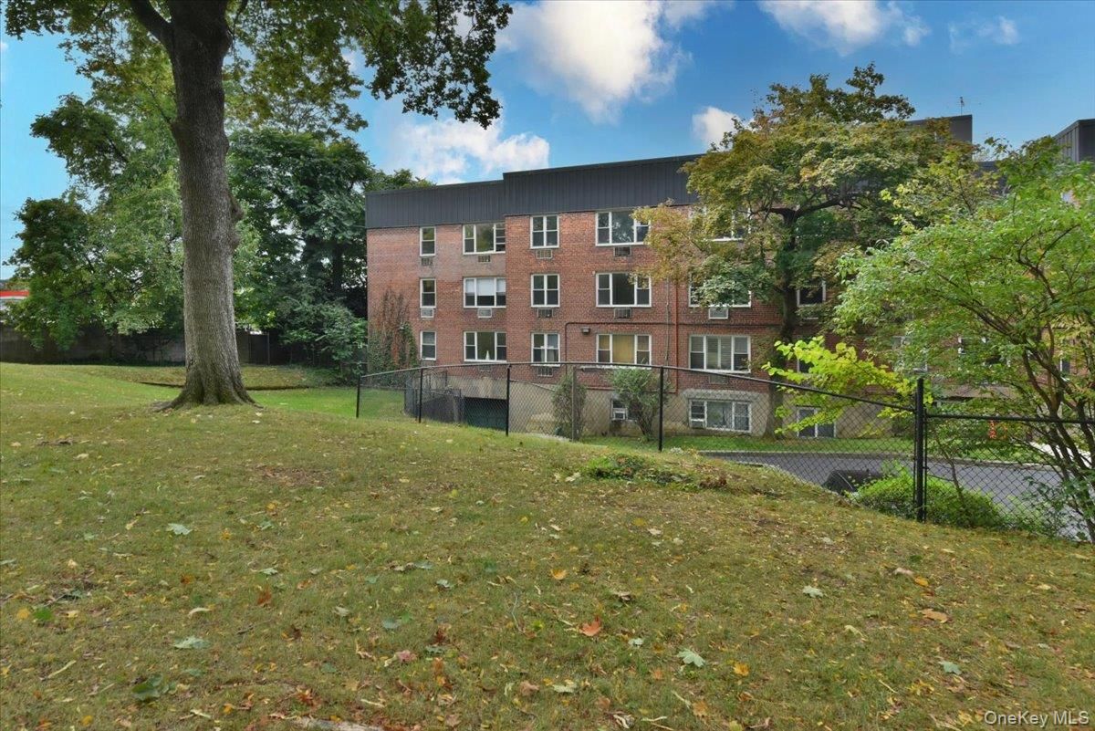Backyard, Exterior, Facade, Brick Facade, Condo Building