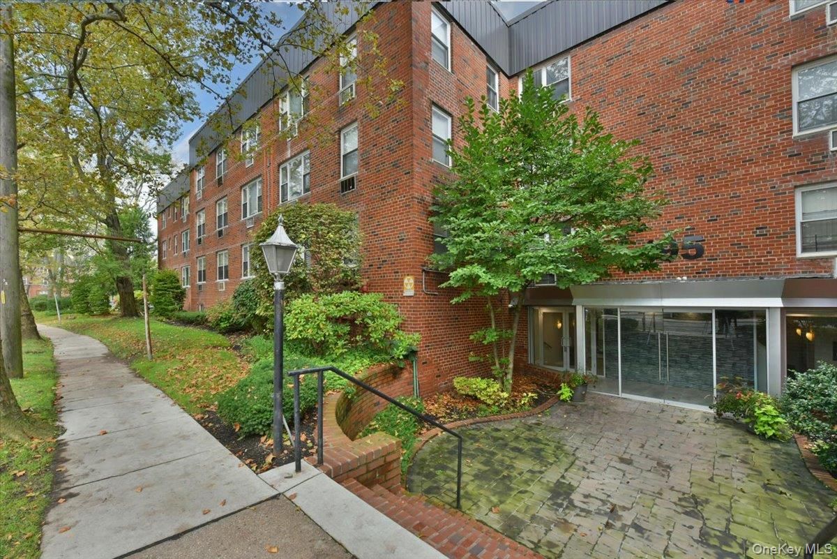 Exterior, Facade, Brick Facade, Condo Building
