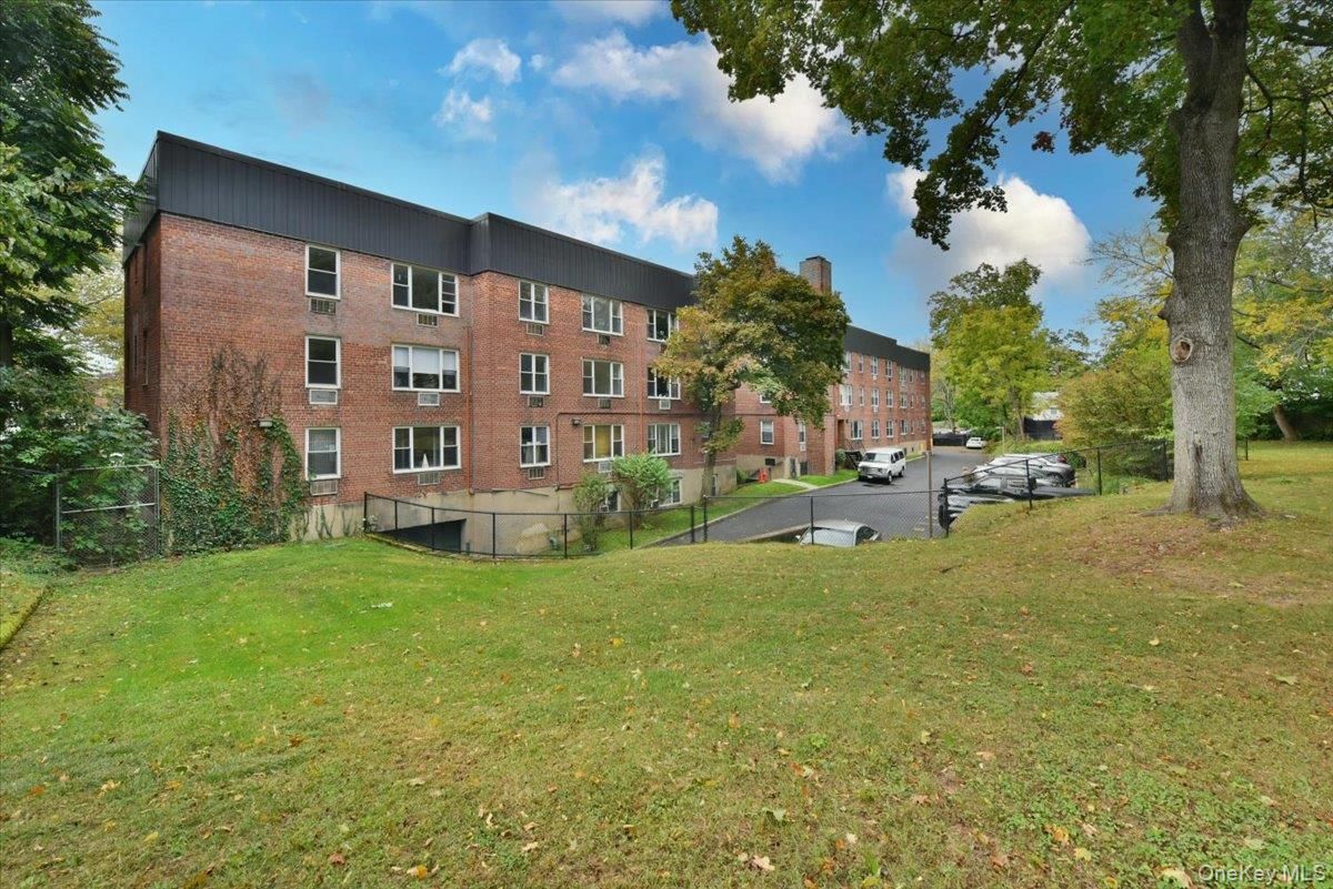 Backyard, Exterior, Facade, Brick Facade, Condo Building