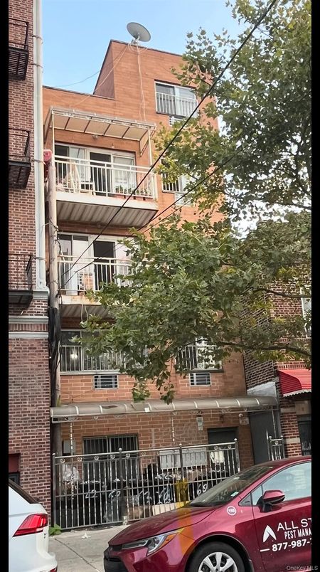 Exterior, Facade, Brick Facade, Condo Building