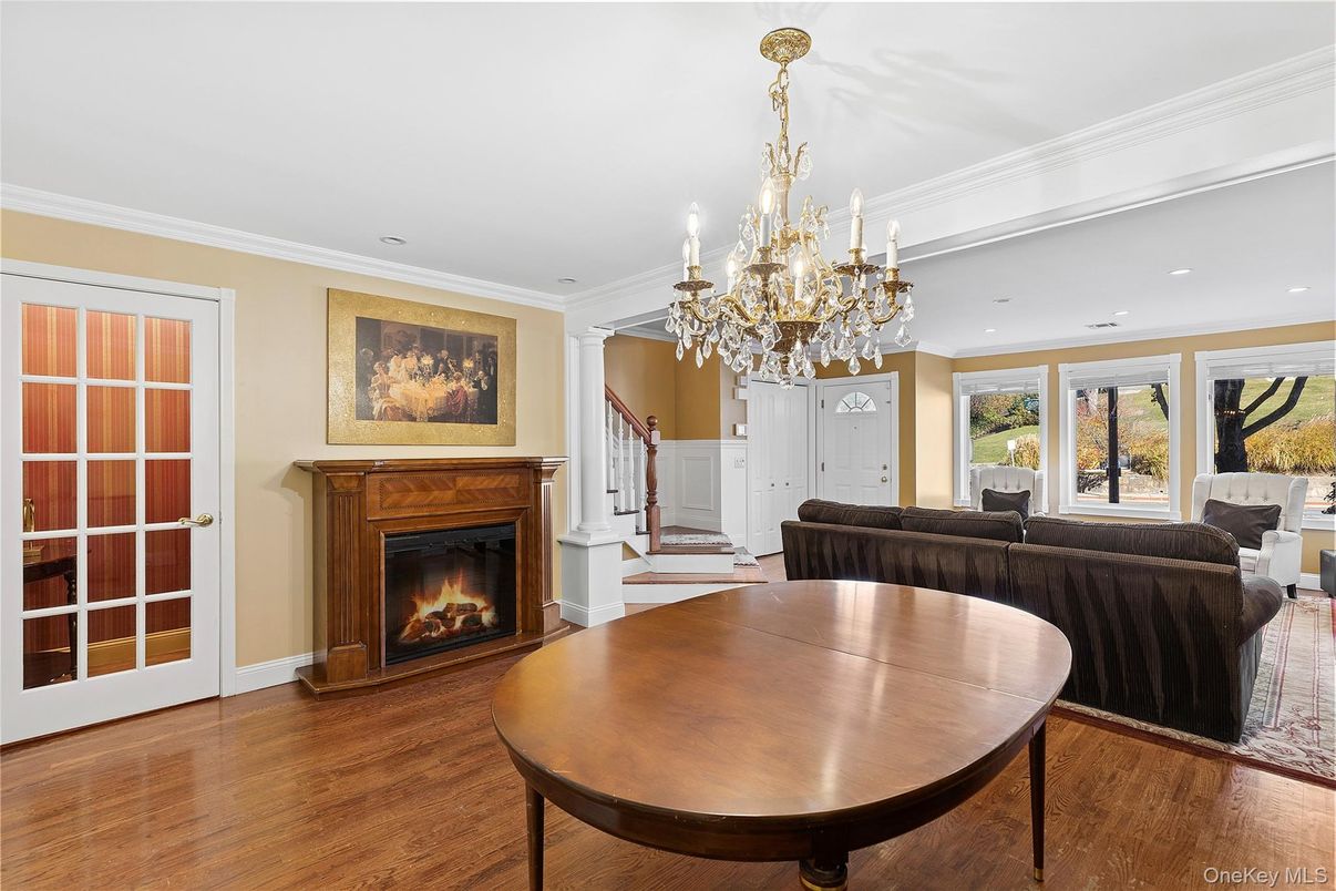 Chandelier, Fireplace, Interior, Living room, Recessed Lighting, Wood Texture Flooring