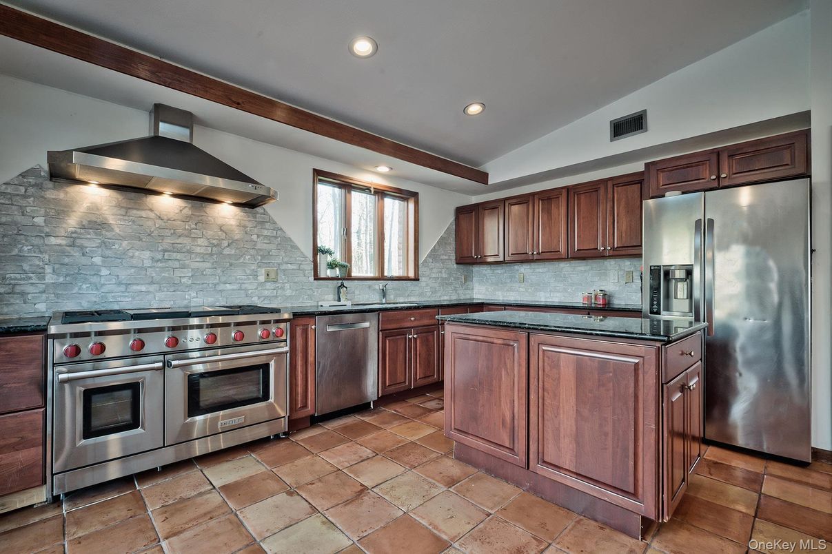 Interior, Kitchen, Recessed Lighting, Stainless Steel Appliances, Stone Walls