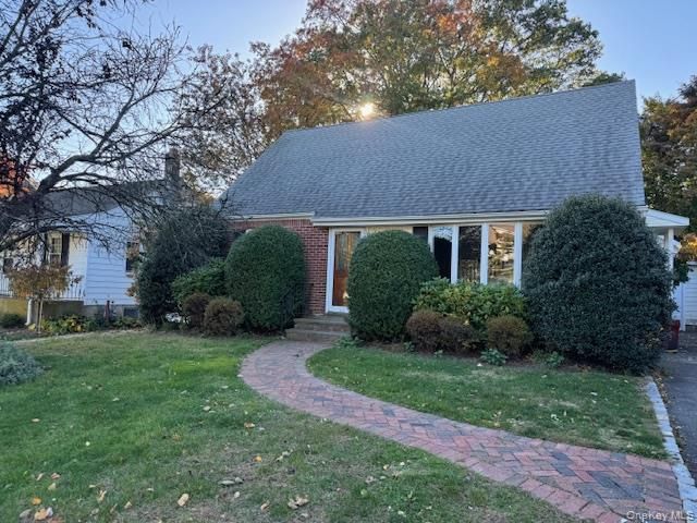 Exterior, Facade, Brick Facade, Cape Cod