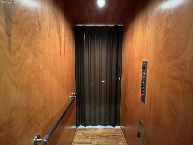 Elevator, Interior, Recessed Lighting, Wooden Ceilings, Wood Texture Flooring, Wooden Walls