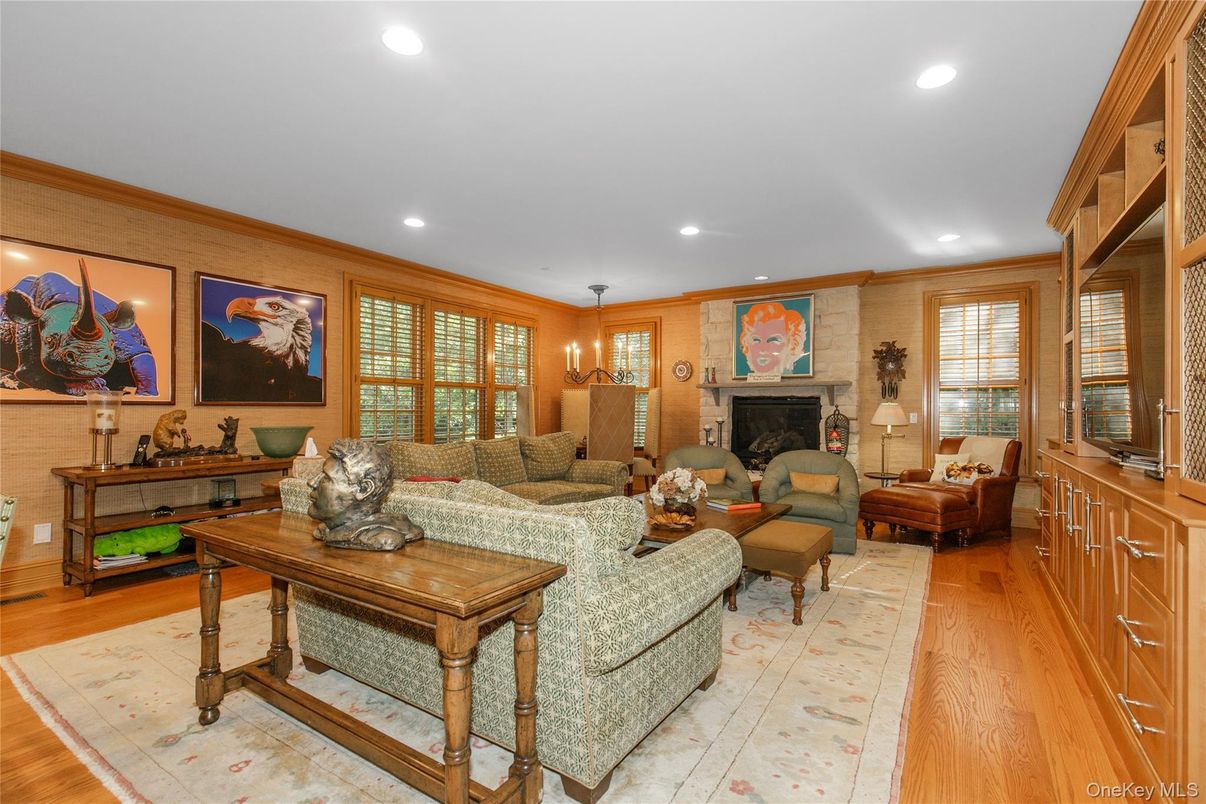 Chandelier, Fireplace, Interior, Living room, Pendant Lights, Recessed Lighting, Wood Texture Flooring