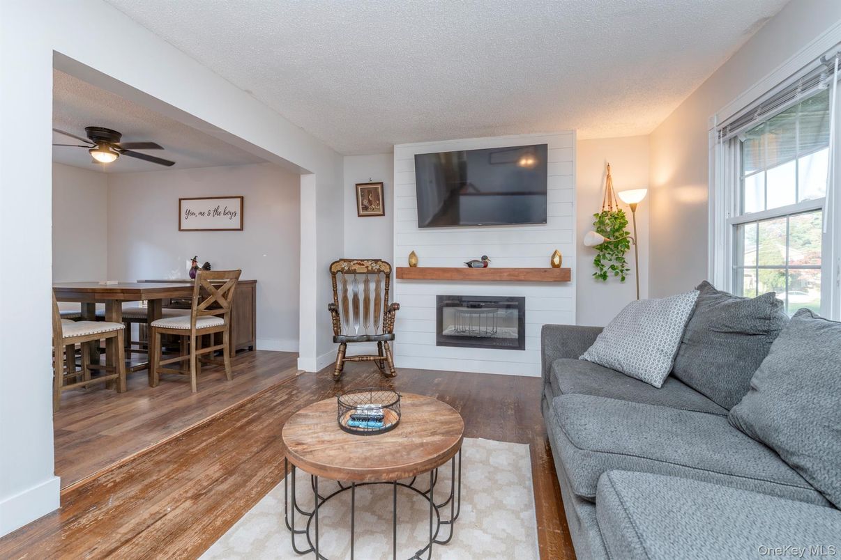 Dining room, Fireplace, Interior, Living room, Wood Texture Flooring