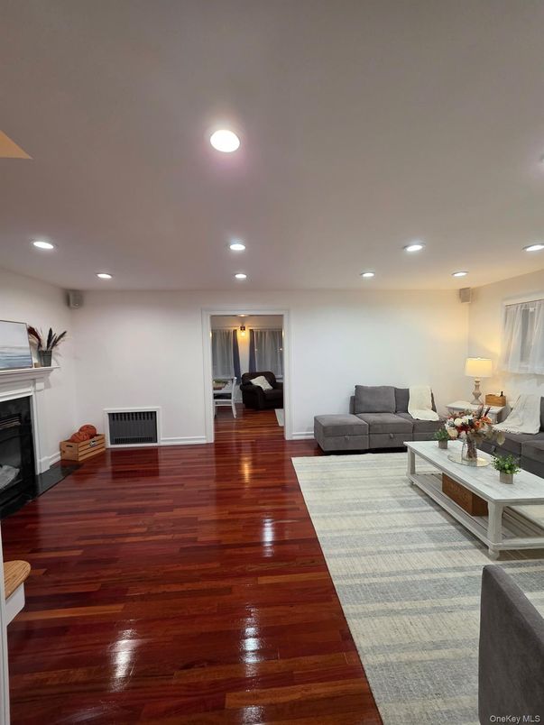Fireplace, Interior, Living room, Recessed Lighting, Wood Texture Flooring