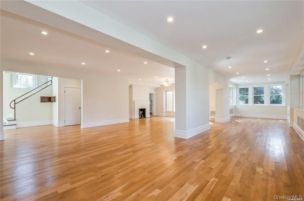 Chandelier, Empty room, Fireplace, Interior, Recessed Lighting, Wood Texture Flooring
