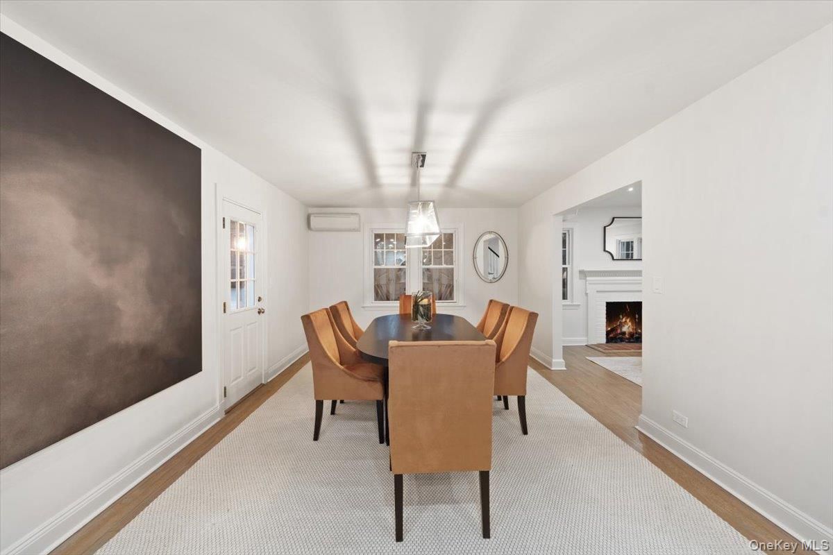 Chandelier, Dining room, Fireplace, Interior, Wood Texture Flooring