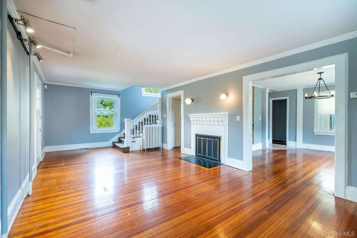 Empty room, Fireplace, Interior, Pendant Lights, Wood Texture Flooring