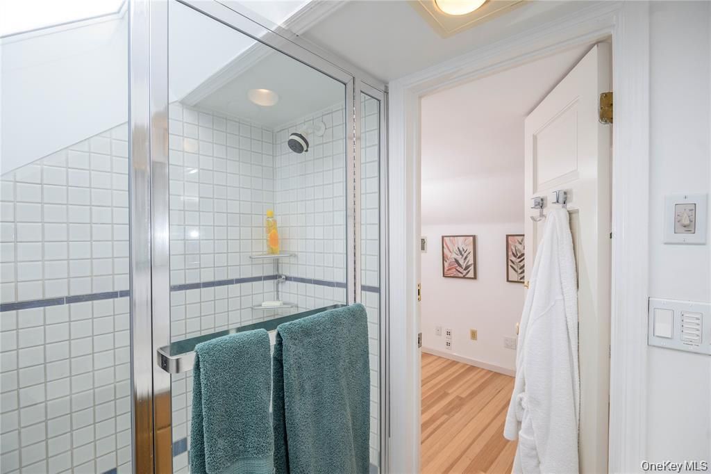 Bathroom, Glass Shower, Interior, Recessed Lighting, Wood Texture Flooring