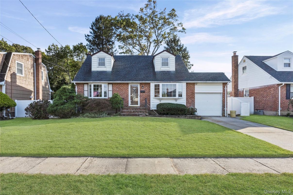 Attached, Exterior, Facade, Brick Facade, Cape Cod