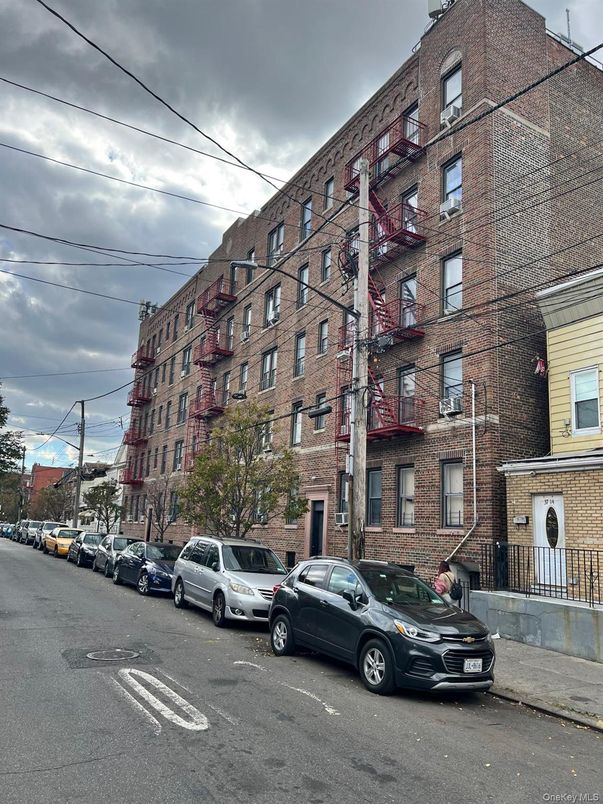 Exterior, Facade, Brick Facade, Condo Building