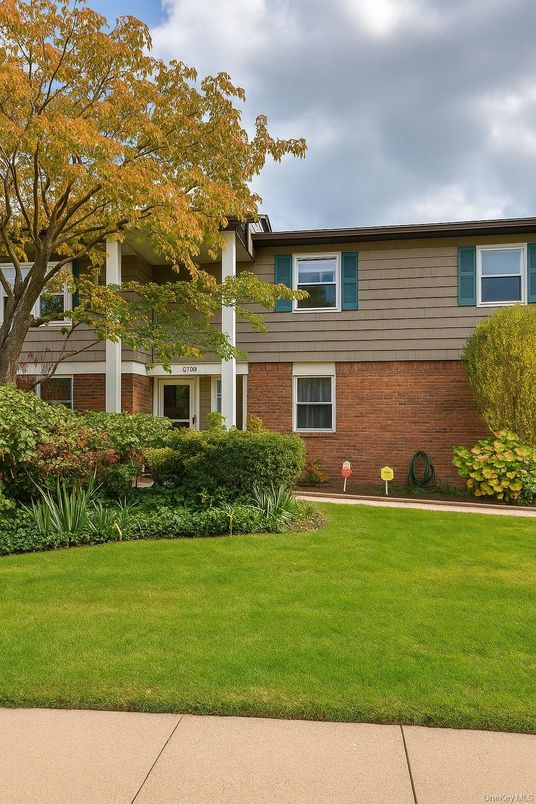 Exterior, Facade, Brick Facade, Raised Ranch