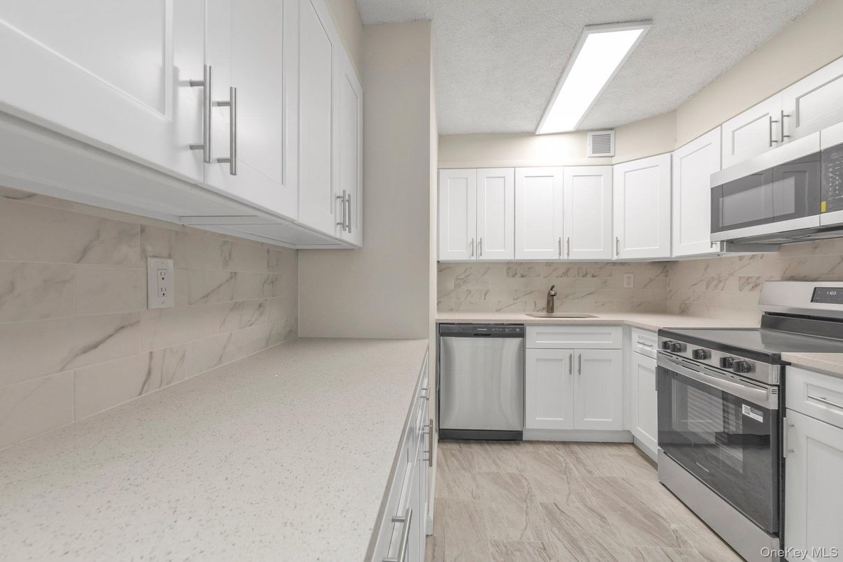 Interior, Kitchen, Marble, Marble Walls, Stainless Steel Appliances