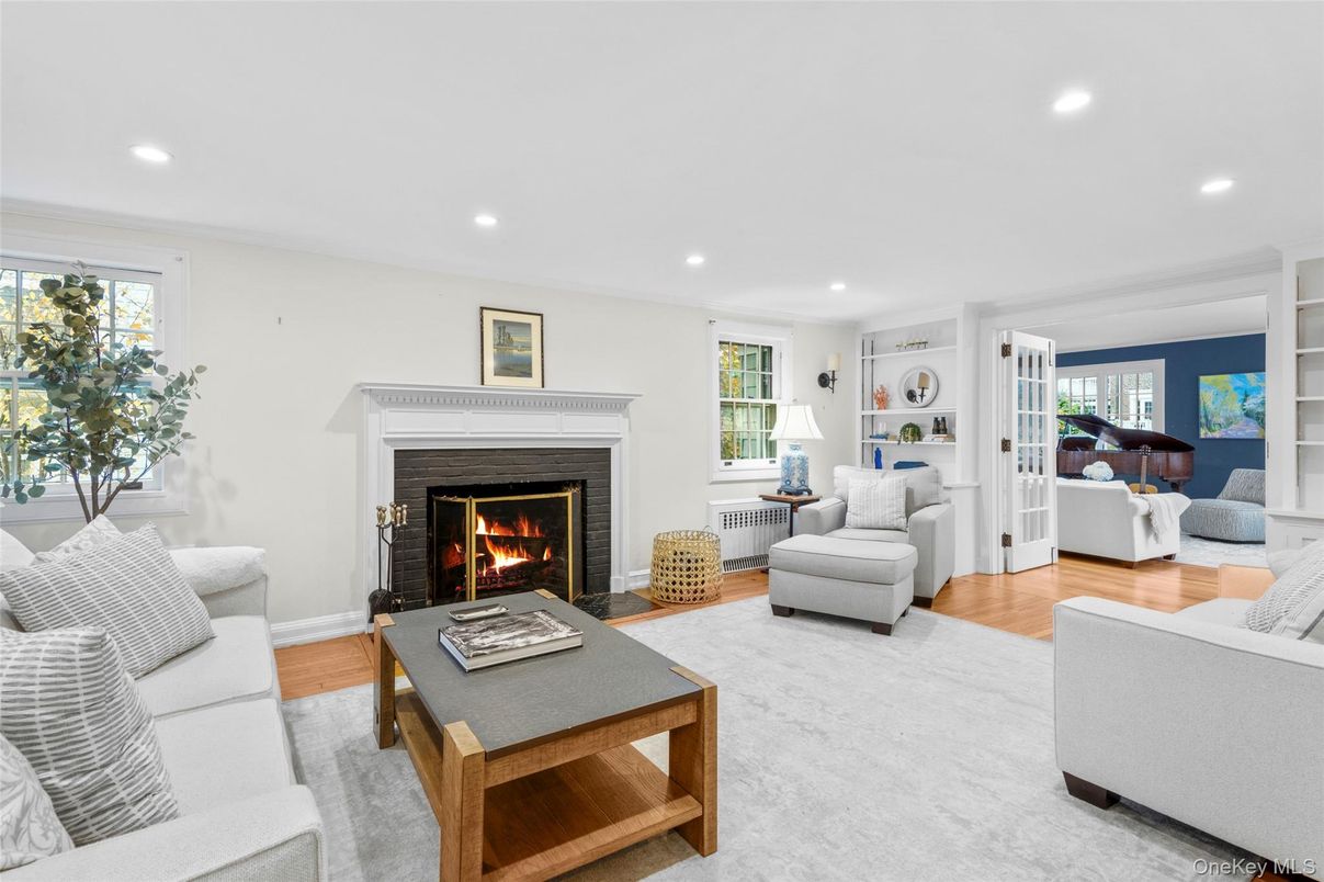 Fireplace, Interior, Living room, Piano, Recessed Lighting, Wood Texture Flooring