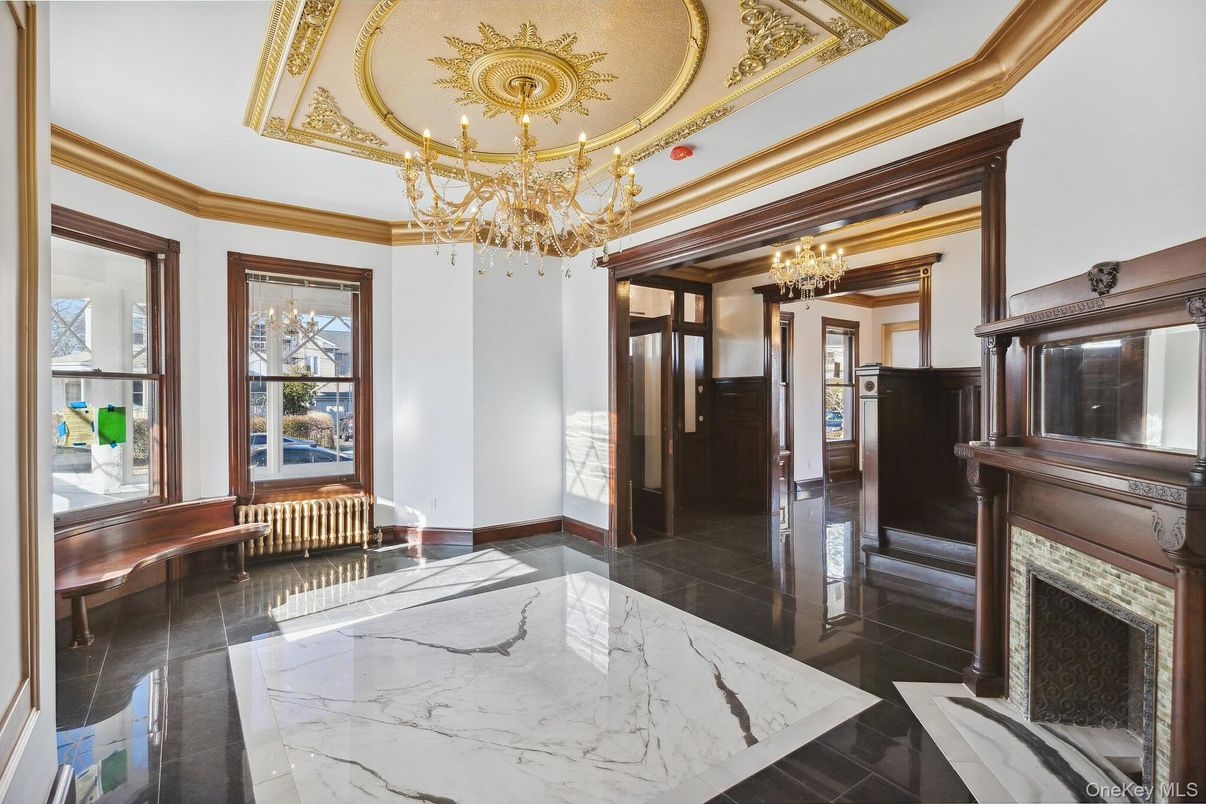 Chandelier, Dining room, Fireplace, Interior, Marble