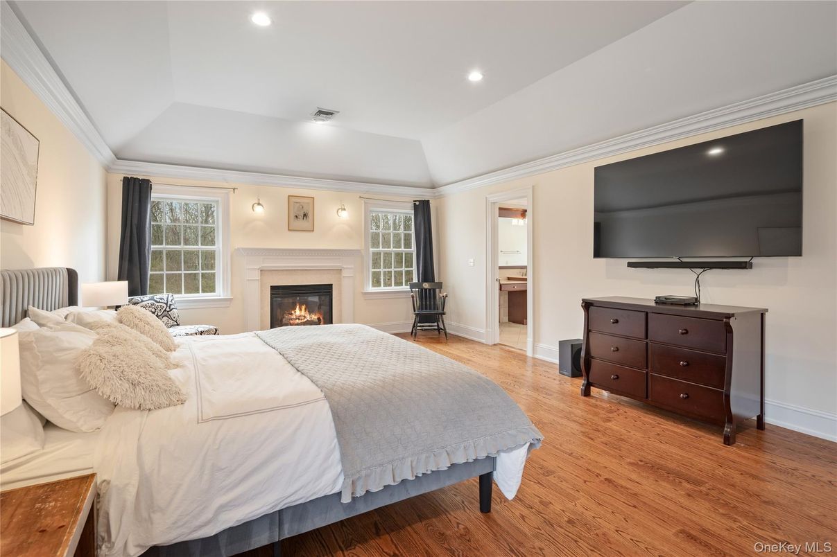 Bedroom, Fireplace, Interior, Recessed Lighting, Wood Texture Flooring