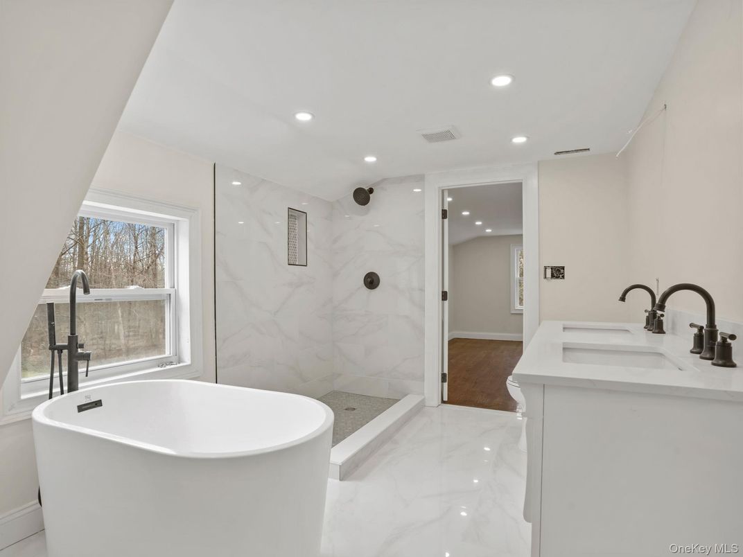 Bathroom, Free Standing Baths, Glass Shower, Interior, Marble, Marble Walls, Recessed Lighting