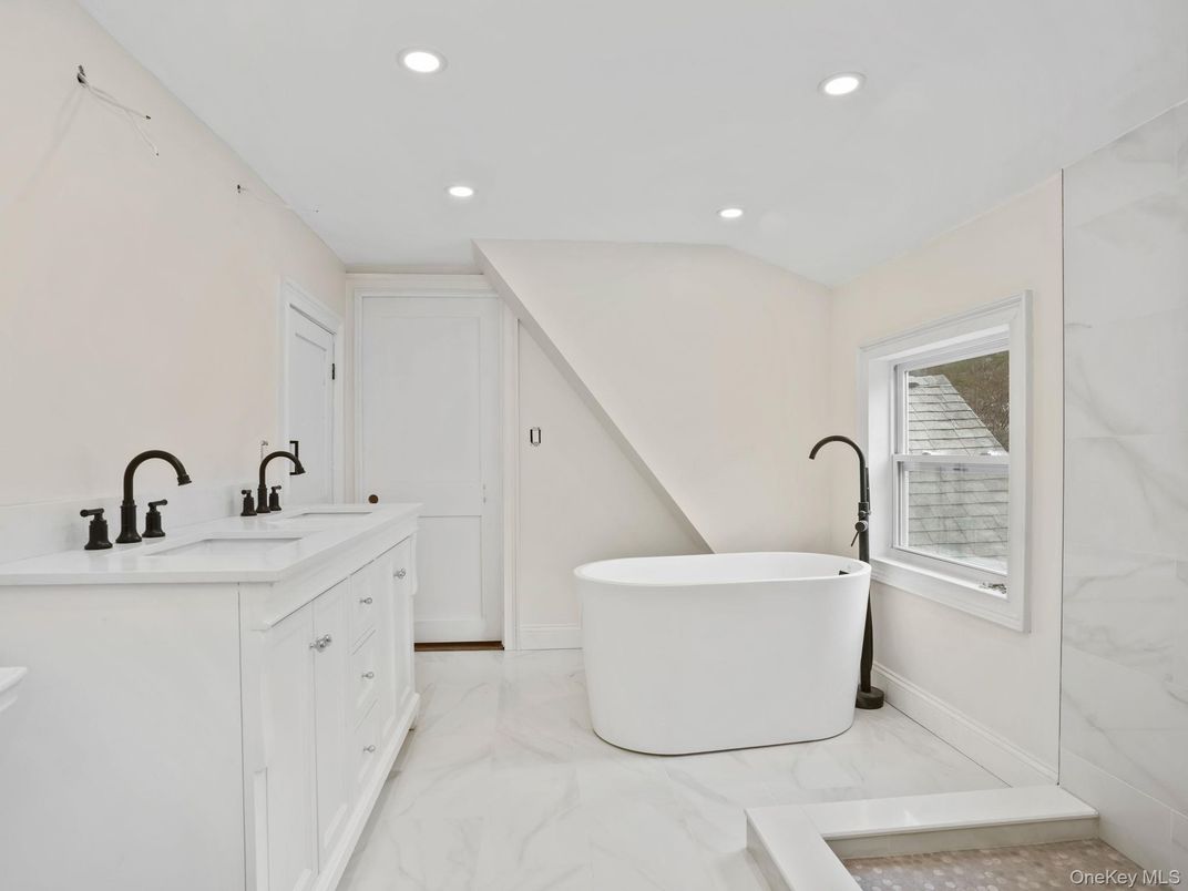 Bathroom, Dual Sink Vanities, Free Standing Baths, Glass Shower, Interior, Marble, Marble Walls, Recessed Lighting