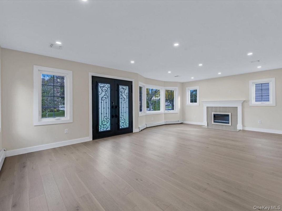 Empty room, Fireplace, Interior, Recessed Lighting, Wood Texture Flooring