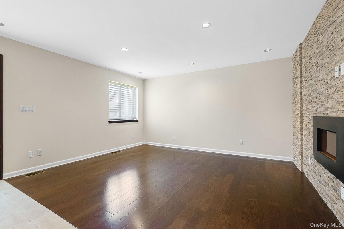 Empty room, Fireplace, Interior, Recessed Lighting, Wood Texture Flooring