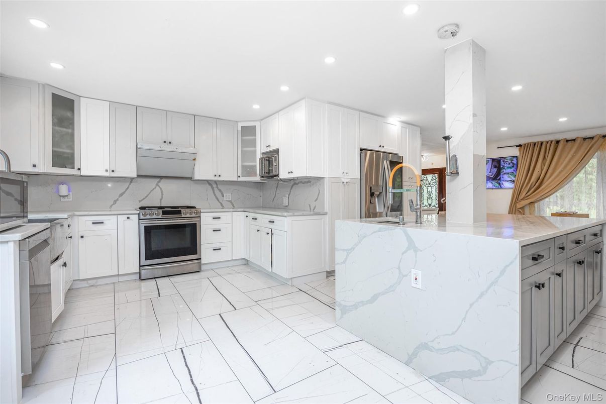 Interior, Kitchen, Marble, Marble Walls, Recessed Lighting, Stainless Steel Appliances