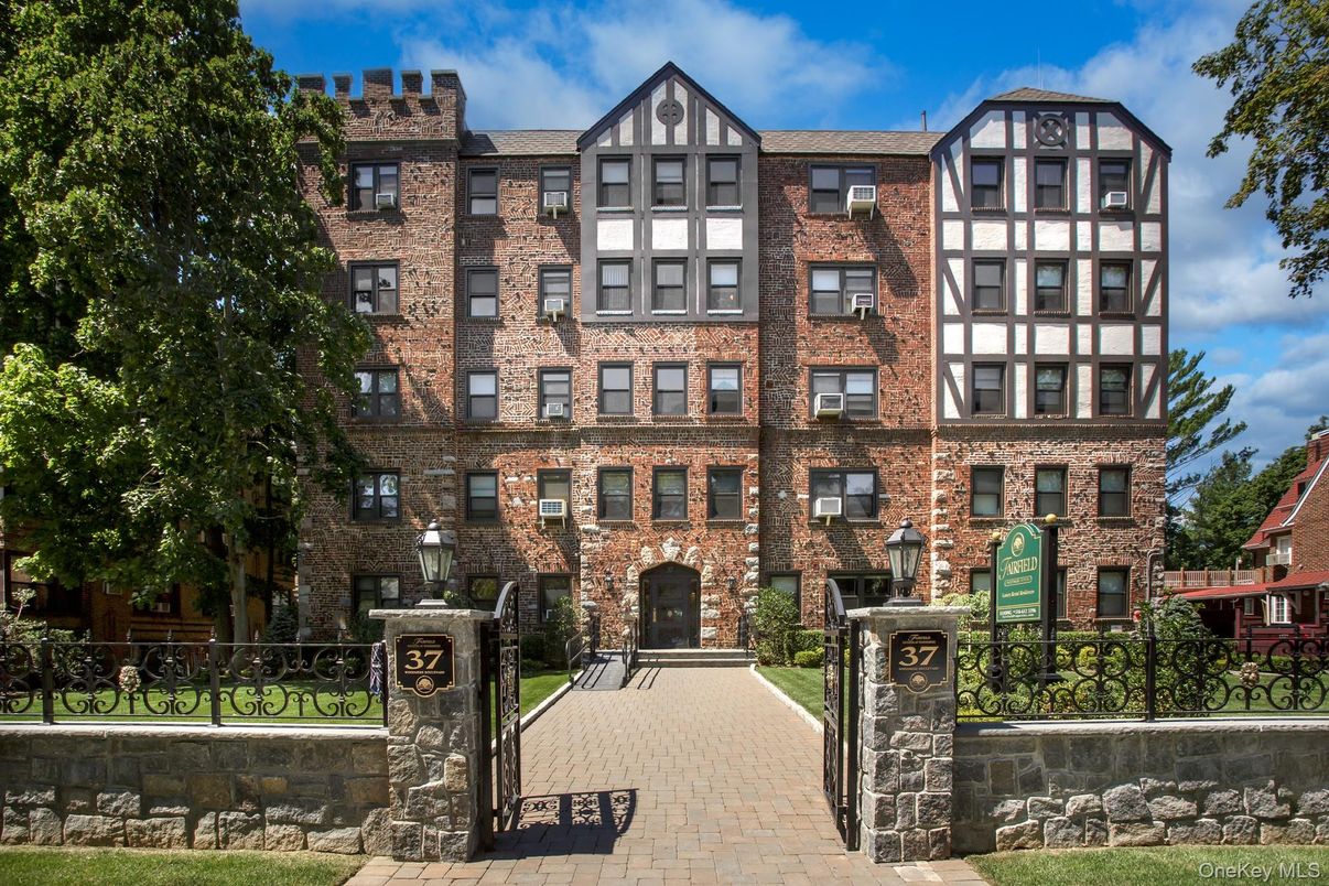 Exterior, Facade, Brick Facade, Condo Building