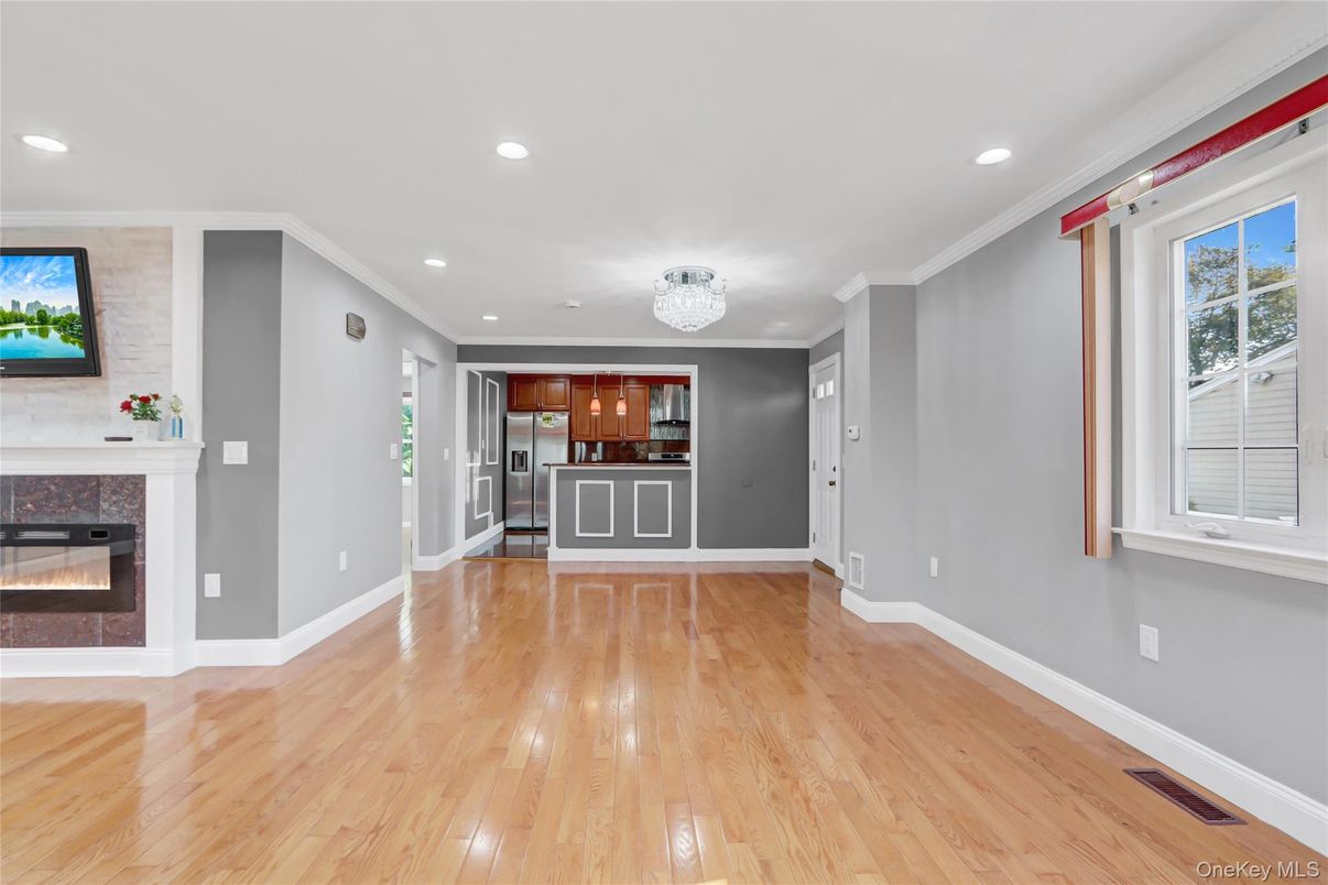 Empty room, Fireplace, Interior, Recessed Lighting, Wood Texture Flooring