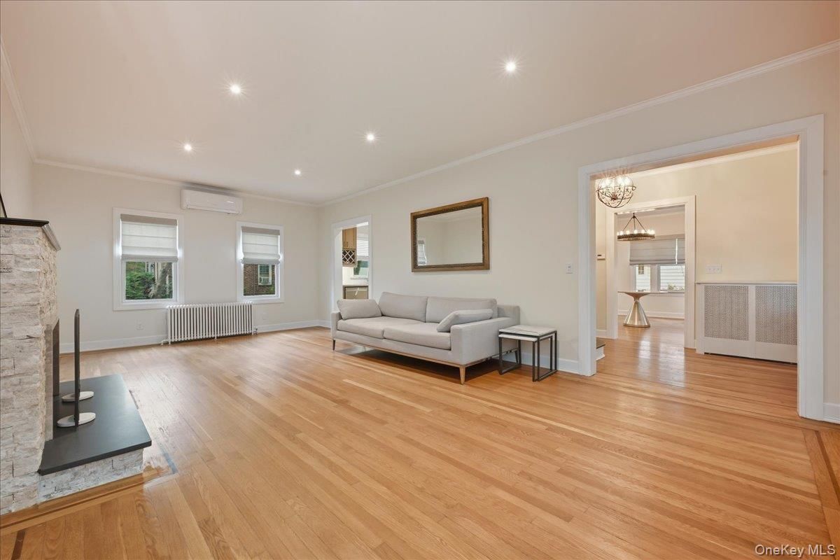 Chandelier, Fireplace, Interior, Living room, Recessed Lighting, Wood Texture Flooring