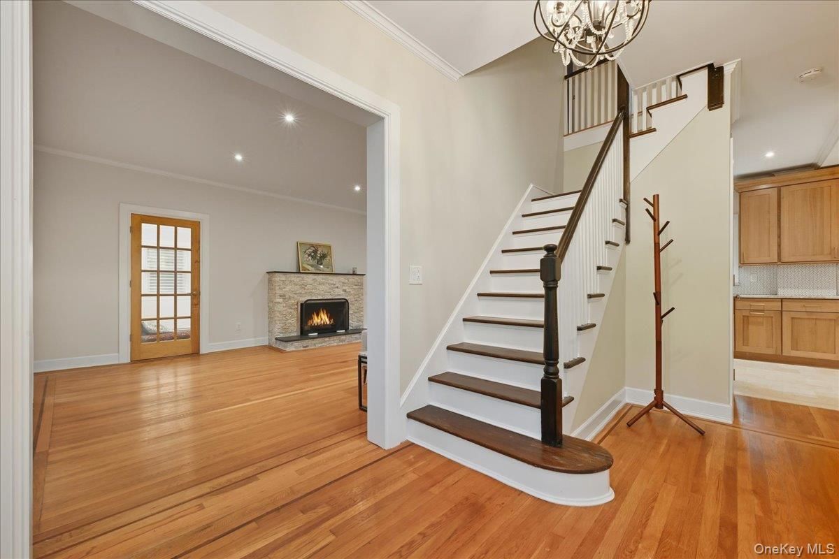 Fireplace, Interior, Pendant Lights, Recessed Lighting, Wood Texture Flooring