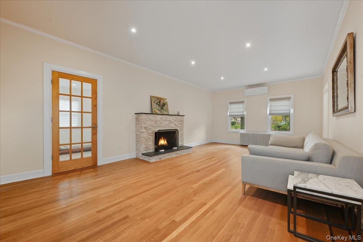 Fireplace, Interior, Living room, Recessed Lighting, Wood Texture Flooring