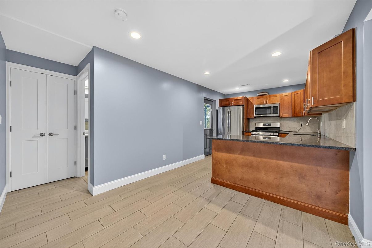 Interior, Kitchen, Recessed Lighting, Stainless Steel Appliances, Wood Texture Flooring