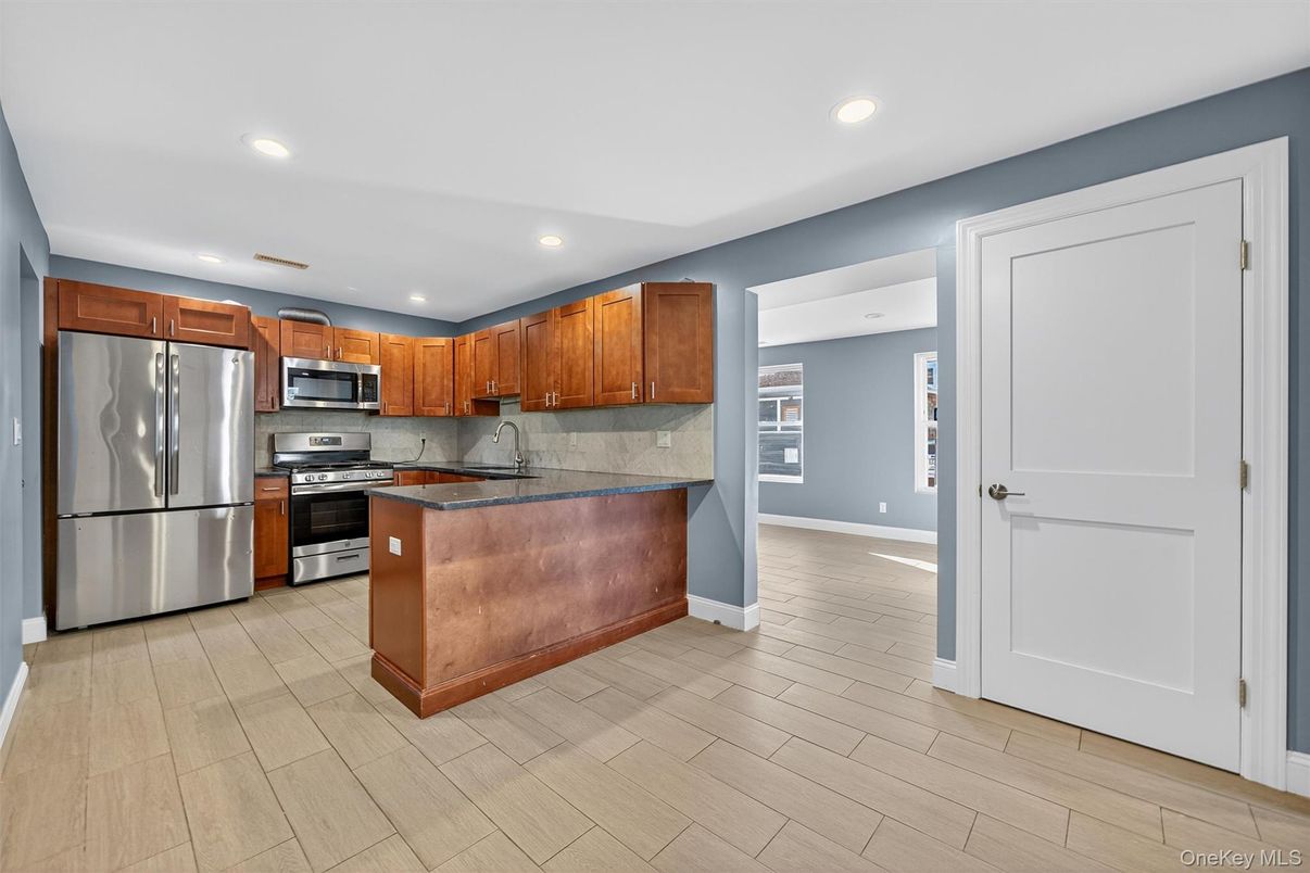Interior, Kitchen, Recessed Lighting, Stainless Steel Appliances, Wood Texture Flooring