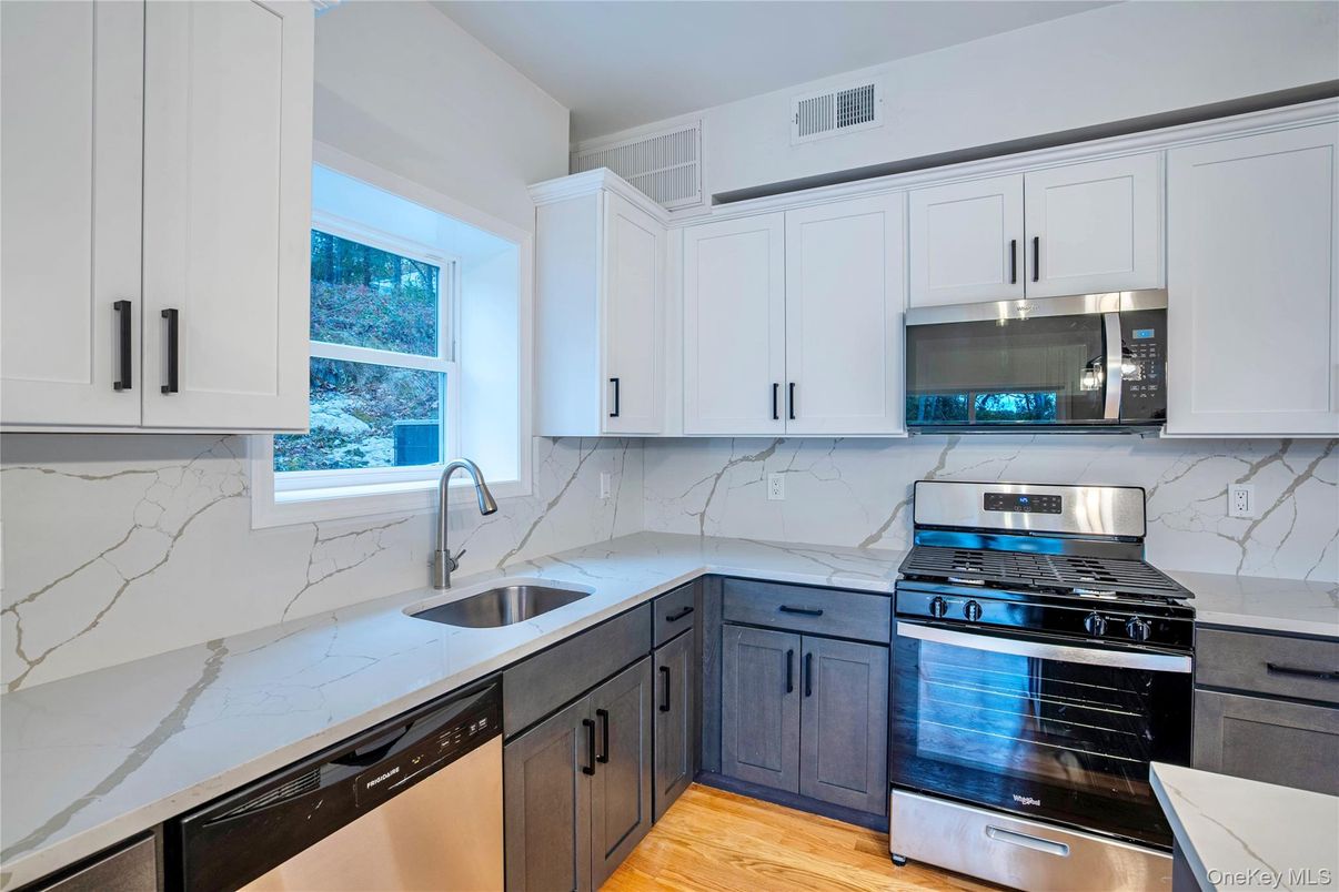 Interior, Kitchen, Marble Walls, Stainless Steel Appliances, Wood Texture Flooring