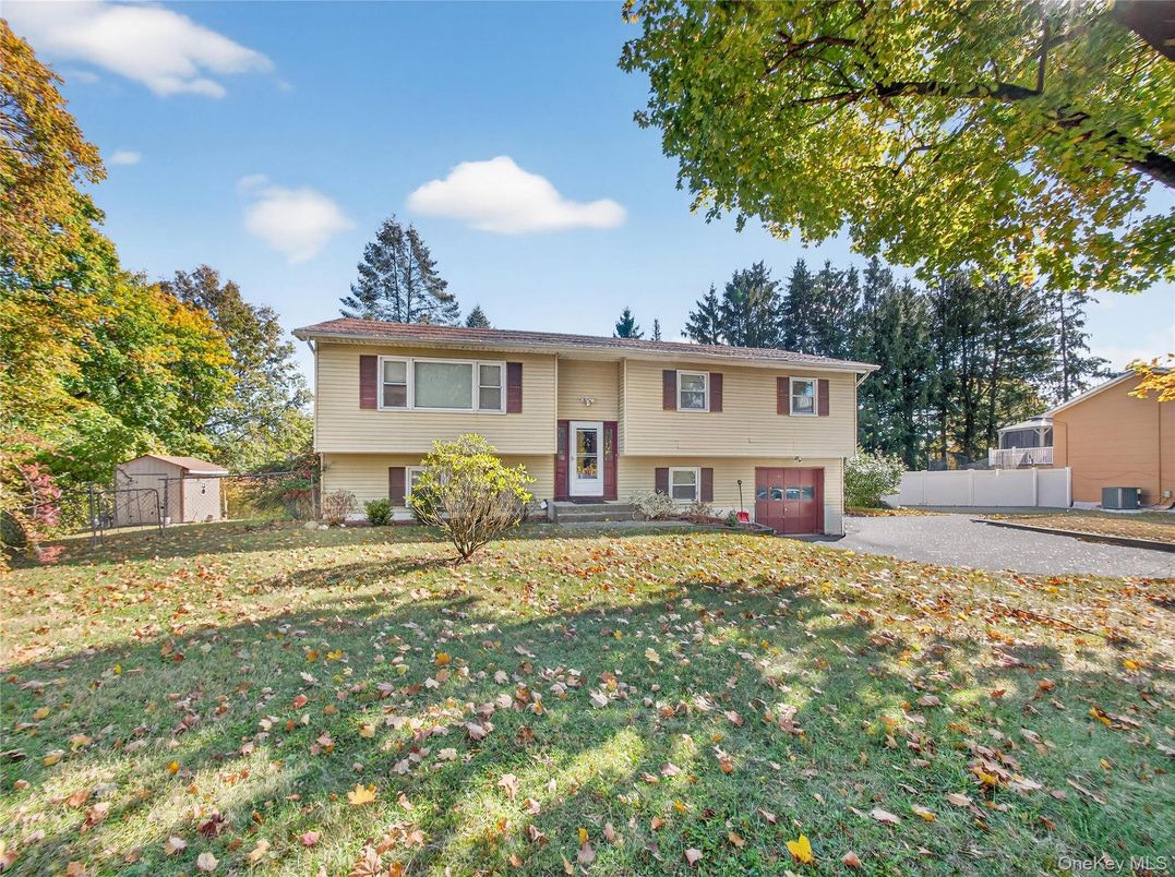 Attached, Backyard, Exterior, Facade, Raised Ranch