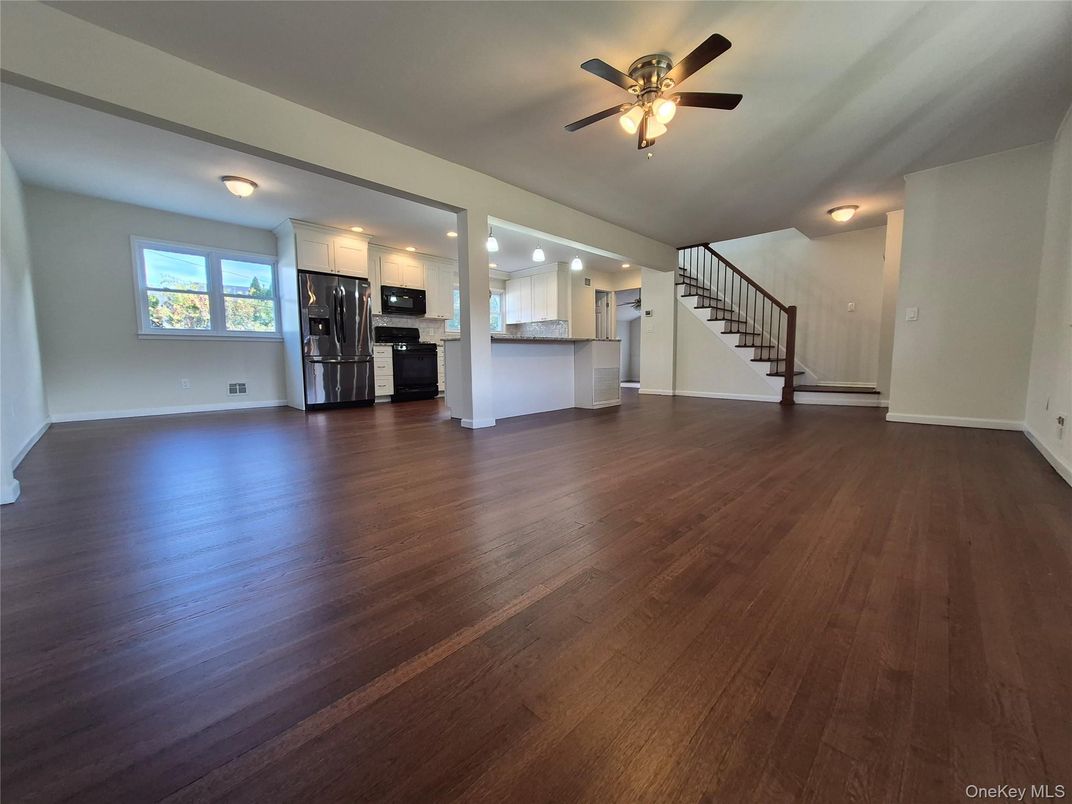 Empty room, Interior, Kitchen, Stainless Steel Appliances, Wood Texture Flooring