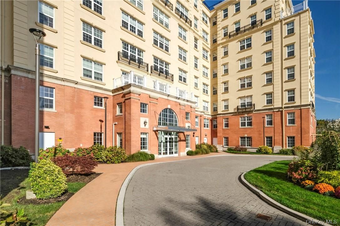 Exterior, Facade, Brick Facade, Condo Building