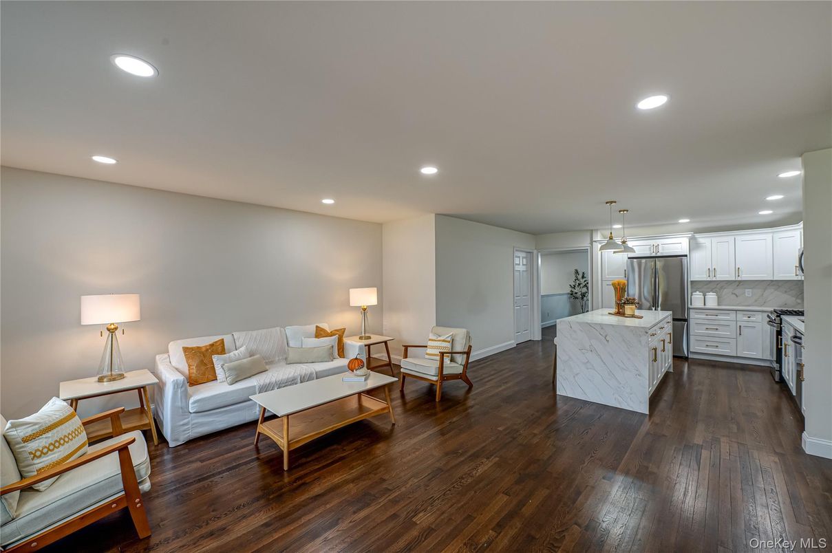 Interior, Kitchen, Living room, Marble Walls, Pendant Lights, Recessed Lighting, Stainless Steel Appliances, Wood Texture Flooring